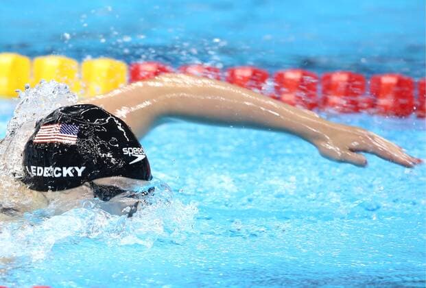 RIO DE JANEIRO, BRAZIL - AUGUST 7, 2016: Katie Ledecky of the United States competes to win the women s 400m freestyle final and set a new world record of 3:56.46 at the Rio 2016 Summer Olympic Games Olympische Spiele Olympia OS at the Olympic Aquatics Stadium. Stanislav Krasilnikov TASS  TS02C3A3