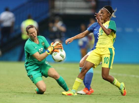 Olympics 2016 Football Manaus MANAUS, AM - 09.08.2016: OLYMPICS 2016 FOOTBALL MANAUS - Ball dispute in Brazil area in the match between South Africa (RSA) vs. Brazil (BRA) for the game of Group E of the Olympic Women& Football Rll Rio Olympics 2016 held in Amazonia Arena in Manaus host city. (Photo: Emanuel Pires Fotoarena) x1176655x  EmanuelxPires