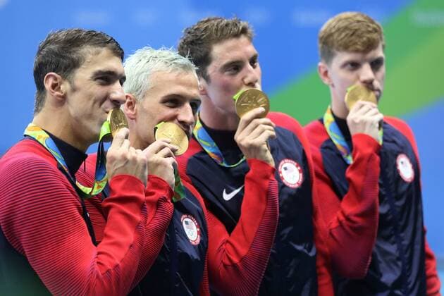 2016 Swimming Olympics RIO DE JANEIRO, RJ - 10.08.2016: 2016 SWIMMING OLYMPICS - gold medalist Townley Haas, Conor Dwyer, Ryan Lochte and Michael Phelps of the United States celebrate during the medal presentation 4 x 200m Freestyle Relay Final Men on 4 of the Rio 2016 Olympic Games Olympische Spiele Olympia OS at the Aquatics Olympic Stadium NOT AVAILABLE FOR LICENSING IN CHINA (Photo: Junior Lago Fotoarena) x1176730x  JuniorxLago