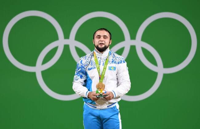 (160810) -- RIO DE JANEIRO, Aug. 10, 2016 -- Gold medalist Nijat Rahimov of Kazakhstan attends the awarding ceremony of the men s 77kg weightlifting final at the 2016 Rio Olympic Games Olympische Spiele Olympia OS in Rio de Janeiro, Brazil, on Aug. 10, 2016. ) (xr) (SP)BRAZIL-RIO DE JANEIRO-OLYMPICS-WEIGHTLIFTING ChengxMin 