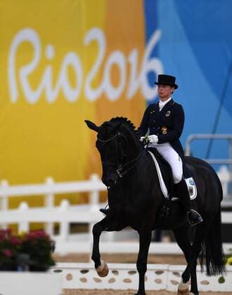 (160812) -- RIO DE JANEIRO, Aug. 12, 2016 -- Germany s Isabell Werth competes during the dressage team grand prix special of Equestrian at the 2016 Rio Olympic Games Olympische Spiele Olympia OS in Rio de Janeiro, Brazil, on Aug. 12, 2016. Germany won the gold medal. ) (xr) (SP)BRAZIL-RIO DE JANEIRO-OLYMPICS-EQUESTRIAN LinxYiguang 