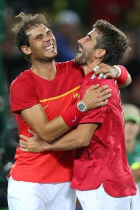 August 12, 2016 - Rio De Janeiro, Rio de Janeiro, Brazil - RJ - Olympic Tennis Games - SPORTS - Rafael Nadal and Marc Lopez of Spain celebrate winning the gold medal in the men s tennis doubles tennis tournament at the Olympic Center in the Olympic Games Olympische Spiele Olympia OS in Rio de Janeiro 2016 in Brazil, this sexta- Friday RIO 2016 - Tennis: Men™s - ZUMAb158