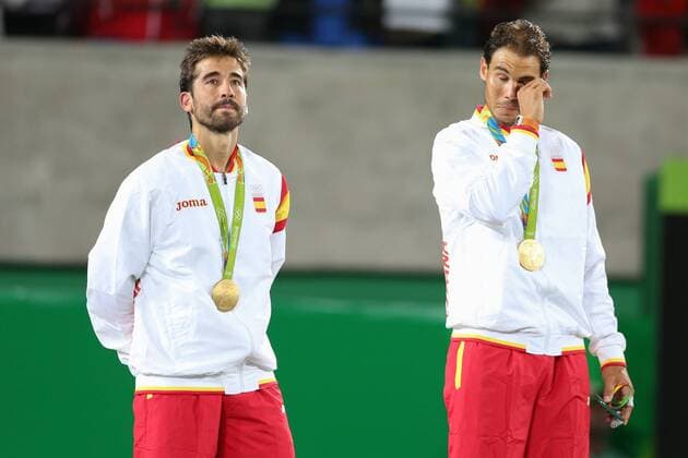 August 12, 2016 - Rio De Janeiro, Rio de Janeiro, Brazil - RJ - Olympic Tennis Games - SPORTS - Rafael Nadal and Marc Lopez of Spain celebrate winning the gold medal in the men s tennis doubles tennis tournament at the Olympic Center in the Olympic Games Olympische Spiele Olympia OS in Rio de Janeiro 2016 in Brazil, this sexta- Friday RIO 2016 - Tennis: Men™s - ZUMAb158