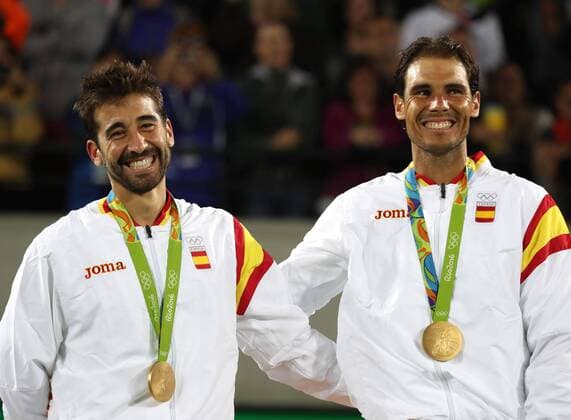Rafael Nadal (R) and Marc Lopez of Spain pose after winning the gold medal in the Rio 2016 Olympic Games Olympische Spiele Olympia OS Men s Doubles at the Olympic Tennis Centre in the Olympic Park in Rio de Janeiro, Brazil, 12 August 2016. Olympic Games 2016 Tennis !ACHTUNG: NUR REDAKTIONELLE NUTZUNG!  JJ00400 20160813-636066571194899887