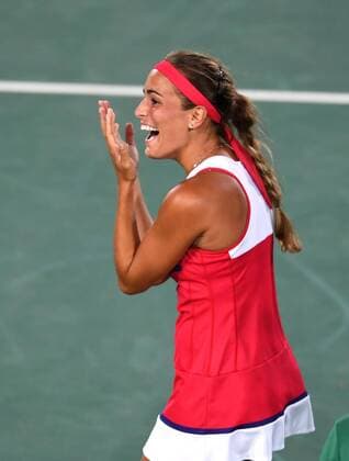 (160813) -- RIO DE JANEIRO, Aug. 13, 2016 -- Puerto Rico s Monica Puig reacts after the women s singles gold medal match of Tennis against Germany s Angelique Kerber at the 2016 Rio Olympic Games Olympische Spiele Olympia OS in Rio de Janeiro, Brazil, on Aug. 13, 2016. Monica Puig won 2-1. ) (xr) (SP)BRAZIL-RIO DE JANEIRO-OLYMPICS-TENNIS ChengxMin 