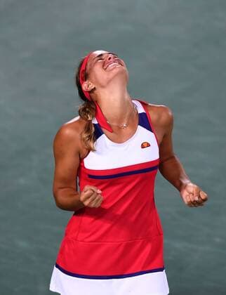 (160813) -- RIO DE JANEIRO, Aug. 13, 2016 -- Puerto Rico s Monica Puig reacts after the women s singles gold medal match of Tennis against Germany s Angelique Kerber at the 2016 Rio Olympic Games Olympische Spiele Olympia OS in Rio de Janeiro, Brazil, on Aug. 13, 2016. Monica Puig won 2-1. ) (xr) (SP)BRAZIL-RIO DE JANEIRO-OLYMPICS-TENNIS ChengxMin 