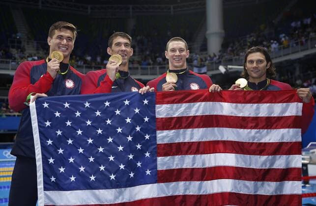(160813) -- RIO DE JANEIRO, Aug. 13, 2016 -- Nathan Adrian, Michael Phelps, Cody Miller and Ryan Murphy (from L to R) of the United States attend the awarding ceremony of the men s 4x100m medley relay final at the 2016 Rio Olympic Games Olympische Spiele Olympia OS in Rio de Janeiro, Brazil, on Aug. 13, 2016. The United States won the gold medal. )(dh) (SP)BRAZIL-RIO DE JANEIRO-OLYMPICS-SWIMMING FeixMaohua 