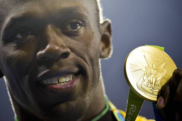 Bilder des Tages - SPORT Rio 2016, Leichtathletik, 100m der Herren, Usain Bolt während der Siegerehrung BOLT Usain JAM - 100m podium - Olympia 2016 in Rio, Leichtathletik - 15 08 2016 JBAutissier Panoramic 