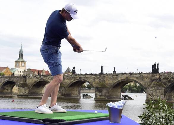 Golf player Thomas Pieters plays his ball during the exhibition in front of the Charles Bridge in Prague , Czech Republic, August 16, 2016, prior to the D+D REAL Czech Masters tournament at the Albatross Golf Resort from August 18-21. (CTKxPhoto RomanxVondrous) CTKPhotoP201608160930401  vnd 5