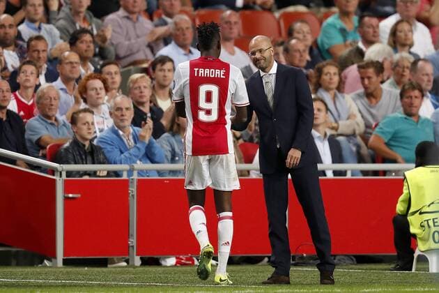 (L-R) Bertrand Traore of Ajax, coach Peter Bosz of Ajax during the Champions League play-off match between Ajax and FK Rostov at the Amsterdam Arena on august 16, 2016 in Amsterdam, the Netherlands Ajax v FK Rostov Champions League 2016 2017 xVIxxIVx 6031575