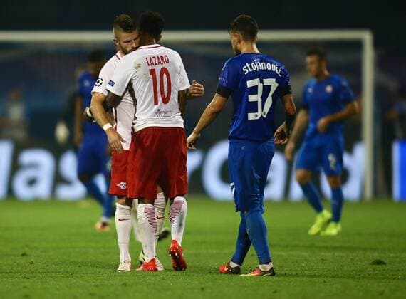 SOCCER - UEFA CL quali, Zagreb vs RBS ZAGREB,CROATIA,16.AUG.16 - SOCCER - UEFA Champions League, Play-off qualification, GNK Dinamo Zagreb vs Red Bull Salzburg. Image shows Valon Berisha and Valentino Lazaro (RBS). GEPAxpictures xFelixxRoittner