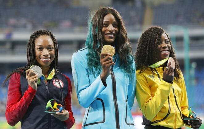Olympics: Women s 400m medal ceremony Gold medalist Shaunae Miller (C) of the Bahamas, silver medalist Allyson Felix (L) of the United States and bronze medalist Shericka Jackson of Jamaica pose with their medals during the medal ceremony for the women s 400-meters at the Rio de Janeiro Olympics on Aug. 16, 2016. 