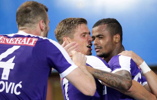 SOCCER - UEFA EL quali, A.Wien vs Rosenborg VIENNA,AUSTRIA,18.AUG.16 - SOCCER - UEFA Europa League, Play-off qualification, FK Austria Wien vs BK Rosenborg Trondheim. Image shows the rejoicing of Petar Filipovic (A.Wien), Jens Stryger Larsen (A.Wien) and Felipe Augusto Rodrigues Pires (A.Wien). GEPAxpictures xPatrickxLeuk