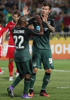 KRASNODAR, RUSSIA - AUGUST 18, 2016: Krasnodar s Joaozinho (22) and Fyodor Smolov (90) celebrate a goal against Partizani Tirana in the first leg of their UEFA Europa League play-off tie at Kuban Stadium. Krasnodar won 4-0. Vitaly Timkiv TASS  TS02DAA9