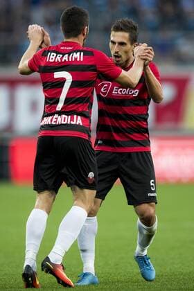 Shkendija s Besart Ibraimi and Shkendija s Armend Alimi celebrate after scoring during the first leg match of the playoff round between Belgian first league soccer team KAA Gent and Macedonia s first league soccer team Shkendija in the Europa League competition, on Thursday 18 August 2016, in Gent. JASPERxJACOBS  x04913880x