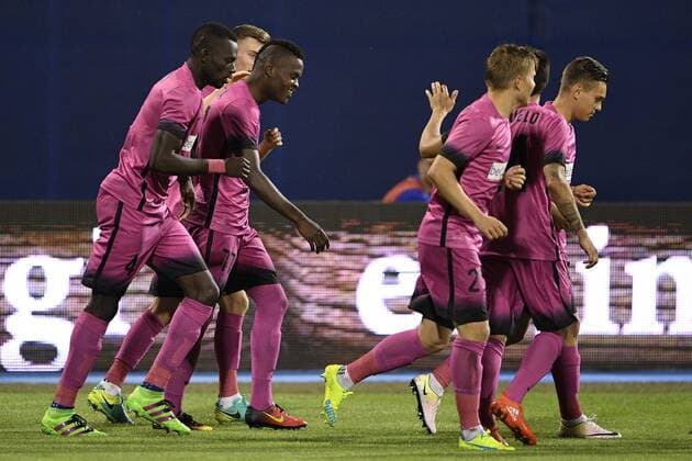 Genk s Mwbana Ally Samatta celebrates after scoring during the first leg match of the playoff round between Croatian team Lokomotiva Zagreb and Belgian first league soccer team KRC Genk in the Europa League competition, on Thursday 18 August 2016, in Zagreb, Croatia. YORICKxJANSENS  x04913969x