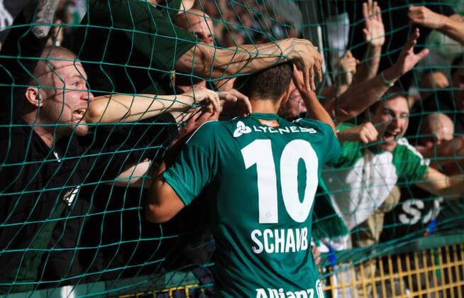 SOCCER - UEFA EL quali, Trencin vs Rapid ZILINA,SLOVAKIA,18.AUG.16 - SOCCER - UEFA Europa League, Play-off qualification, FK AS Trencin vs SK Rapid Wien. Image shows Louis Schaub (Rapid) with fans. Keywords: Wien Energie. GEPAxpictures xPhilippxBrem
