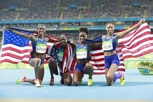 (160819) -- RIO DE JANEIRO, Aug. 19, 2016 -- English Gardner, Tori Bowie, Tianna Bartoletta and Allyson Felix (L-R) of the United States of America celebrate after the women s 4x100m relay final of Athletics at the 2016 Rio Olympic Games Olympische Spiele Olympia OS in Rio de Janeiro, Brazil, on Aug. 19, 2016. The U.S. team won the gold medal. ) (xr) (SP)BRAZIL-RIO DE JANEIRO-OLYMPICS-ATHLETICS RenxZhenglai 