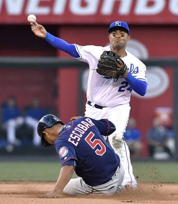 August 20, 2016 - Kansas City, MO, USA - Kansas City Royals second baseman Christian Colon forces out Minnesota Twins Eduardo Escobar at second and completes the double play on Kurt Suzuki at first to end the op of the fifth inning during Saturday s baseball game on Aug. 20, 2016 at Kauffman Stadium in Kansas City, Mo. Twins vs. Royals - ZUMAm67_