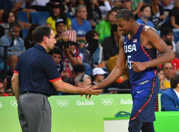 Kevin Durant shakes hands with coach Mike Krzyzewski of the United States when he comes out of the game in the second half against Serbia in the Men s Basketball gold medal game between Serbia and the United States at Carioca Arena 1 at the 2016 Rio Summer Olympics in Rio de Janeiro, Brazil, on August 21, 2016. The United States defeated Serbia 96-66 to win the gold medal.  OLY201608211524 KEVINxDIETSCH