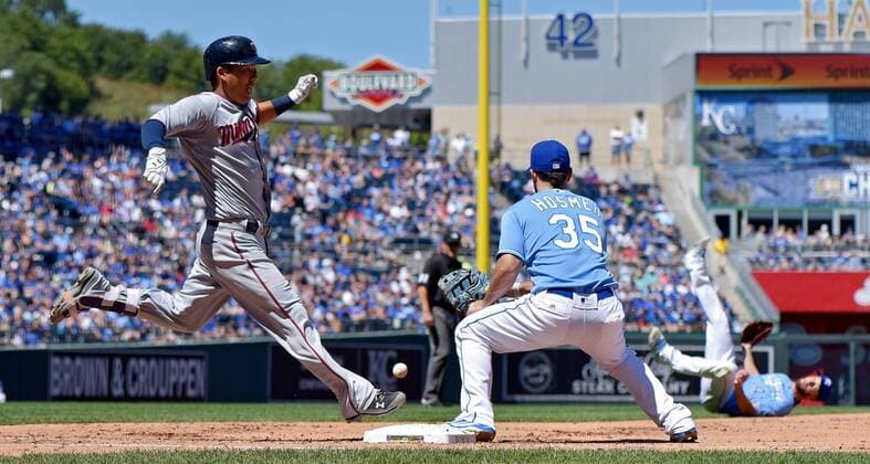 August 21, 2016 - Kansas City, MO, USA - Minnesota Twins Kurt Suzuki reaches first on a throwing error from Kansas City Royals starting pitcher Danny Duffy to first baseman Eric Hosmer in the fourth inning on Sunday, Aug. 21, 2016 at Kauffman Stadium in Kansas City, Mo. Minnesota Twins vs. Kansas City Royals - ZUMAm67_