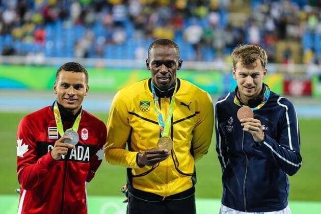 Athletics Rio 2016 Olympics RIO DE JANEIRO, RJ - 19.08.2016: ATHLETICS RIO 2016 OLYMPICS - 200m podium in Athletics Rio 2016 Olympic Games Olympische Spiele Olympia OS at the Olympic Stadium: Usain Bolt (JAM) is gold, Andre De Grasse (CAN) is silver and Christophe Lemaitre (FRA) is bronze. (Photo: Fernanda Paradizo Fotoarena) x1193269x  FernandaxParadizo