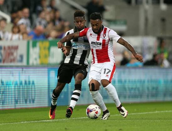 . 23 08 2016. Newcastle, United Kingdom. Newcastle United v Cheltenham Town. St James Park. Newcastle United™s Rolando Aarons and Cheltenham Town™s Jordan Cranston.  xChrisxBoothx xixImagesx IIM-13332-0007