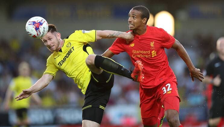 Calum Butcher Burton Albion and Joel Matip Liverpool during the Football League Cup Second Round at The Pirelli Stadium. Picture date: August 23rd, 2016. Pic Lynne Cameron Sportimage EDITORIAL USE ONLY. No use with unauthorised audio, video, data, fixture lists, club league logos or live services. Online in-match use limited to 120 images, no video emulation. No use in betting, games or single club league player publications.