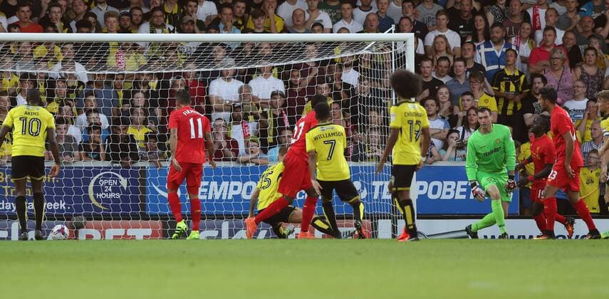 Divock Origi of Liverpool scores during the Football League Cup Second Round at The Pirelli Stadium. Picture date: August 23rd, 2016. Pic Lynne Cameron Sportimage EDITORIAL USE ONLY. No use with unauthorised audio, video, data, fixture lists, club league logos or live services. Online in-match use limited to 120 images, no video emulation. No use in betting, games or single club league player publications.