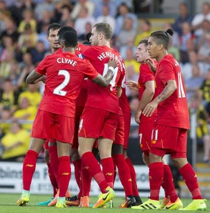 23.08.2016. Pirelli Stadium, Burton on Trent, England. EFL Cup Football. Burton Albion versus Liverpool. Liverpool striker Divock Origi celebrates with his team mates after scoring the first goal of the match after 15 minutes. xRolandxHarrisonx  ActionPlus11779463