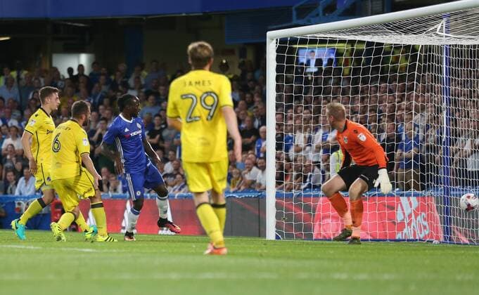 Chelsea s Victor Moses scoring his sides second goal during the EFL Cup match at the Stamford Bridge Stadium, London. Picture date August 23rd, 2016 Pic David Klein Sportimage EDITORIAL USE ONLY. No use with unauthorised audio, video, data, fixture lists, club league logos or live services. Online in-match use limited to 120 images, no video emulation. No use in betting, games or single club league player publications.