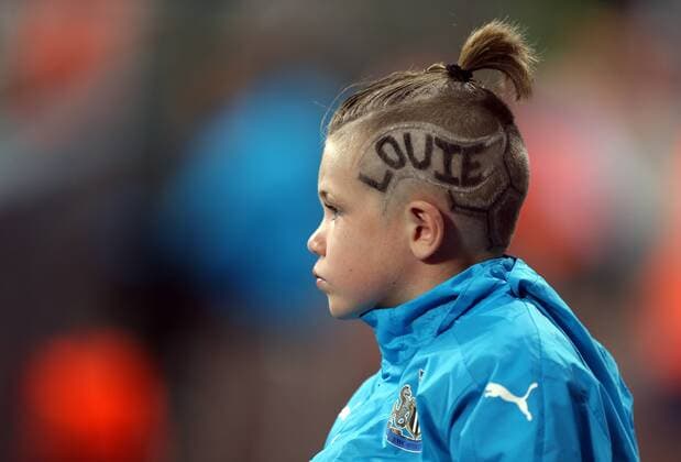 . 23 08 2016. Newcastle, United Kingdom. Newcastle United v Cheltenham Town. St James Park. A young ball boy with an interesting haircut..  xChrisxBoothx xixImagesx IIM-13332-0015