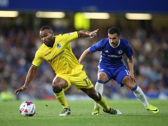 Chelsea s Pedro tussles with Bristol Rovers Jermaine Easter during the EFL Cup match at the Stamford Bridge Stadium, London. Picture date August 23rd, 2016 Pic David Klein Sportimage EDITORIAL USE ONLY. No use with unauthorised audio, video, data, fixture lists, club league logos or live services. Online in-match use limited to 120 images, no video emulation. No use in betting, games or single club league player publications.