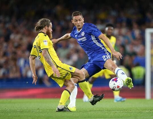 Chelsea s Nemanja Matic tussles with Bristol Rovers Stuart Sinclair during the EFL Cup match at the Stamford Bridge Stadium, London. Picture date August 23rd, 2016 Pic David Klein Sportimage EDITORIAL USE ONLY. No use with unauthorised audio, video, data, fixture lists, club league logos or live services. Online in-match use limited to 120 images, no video emulation. No use in betting, games or single club league player publications.