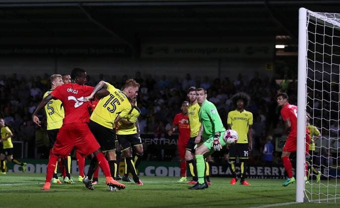 Ere Can or Divock Origi of Liverpool scores the third goal of Liverpool scores the second goal during the Football League Cup Second Round at The Pirelli Stadium. Picture date: August 23rd, 2016. Pic Lynne Cameron Sportimage EDITORIAL USE ONLY. No use with unauthorised audio, video, data, fixture lists, club league logos or live services. Online in-match use limited to 120 images, no video emulation. No use in betting, games or single club league player publications.