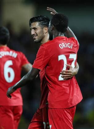 Ere Can and Divock Origi of Liverpool celebrates the third goal of Liverpool scores the second goal during the Football League Cup Second Round at The Pirelli Stadium. Picture date: August 23rd, 2016. Pic Lynne Cameron Sportimage EDITORIAL USE ONLY. No use with unauthorised audio, video, data, fixture lists, club league logos or live services. Online in-match use limited to 120 images, no video emulation. No use in betting, games or single club league player publications.