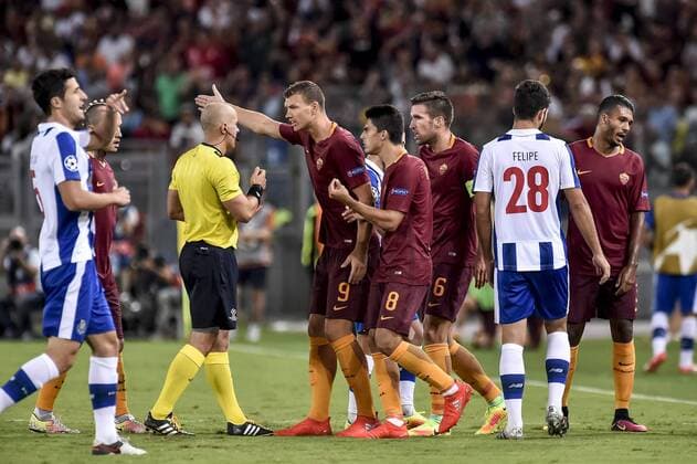 August 23, 2016 - Rome, Italy - Players of roma protest the referee after Emerson Palmieri received the red card during the match between FC Porto v AS Rome UEFA Champions League playoff match in Rome, Italy, on August 23, 2016. AS Roma v Porto: UEFA Champions League  - ZUMAn230