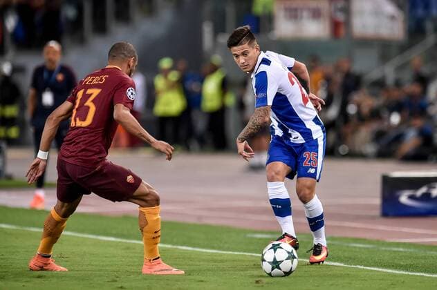 August 23, 2016 - Rome, Italy - Porto s Brazilian midfielder Otavio (R) in action with Peres of Roma (L) during the UEFA Champions League playoff match between AS Roma and FC Porto, at Olympic Stadium in Rome on August 23, 2016. AS Roma v Porto - UEFA Champions League  - ZUMAn230
