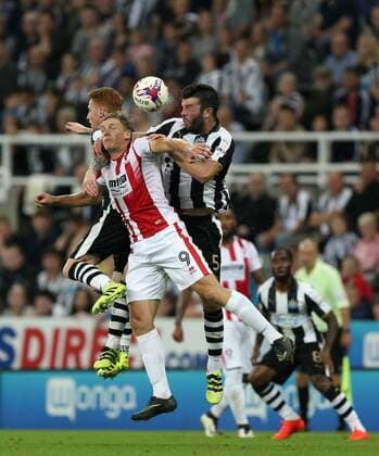 . 23 08 2016. Newcastle, United Kingdom. Newcastle United v Cheltenham Town. St James Park. Newcastle United™s Jack Colback and Grant Hanley and Cheltenham Town™s Danny Wright.  xChrisxBoothx xixImagesx IIM-13332-0017