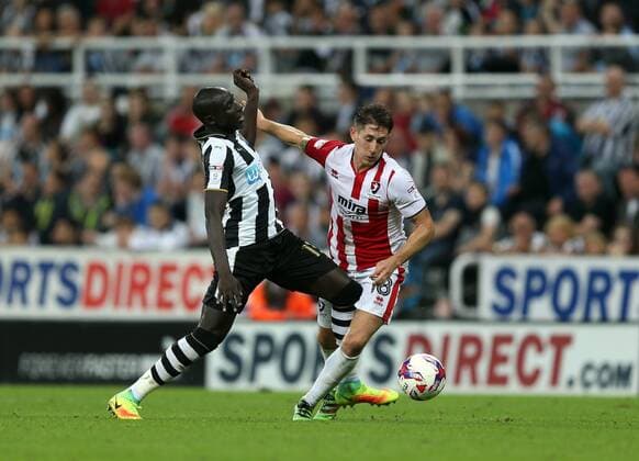 . 23 08 2016. Newcastle, United Kingdom. Newcastle United v Cheltenham Town. St James Park. Newcastle United™s Mohamed Diame and Cheltenham Town™s James Rowe.  xChrisxBoothx xixImagesx IIM-13332-0018