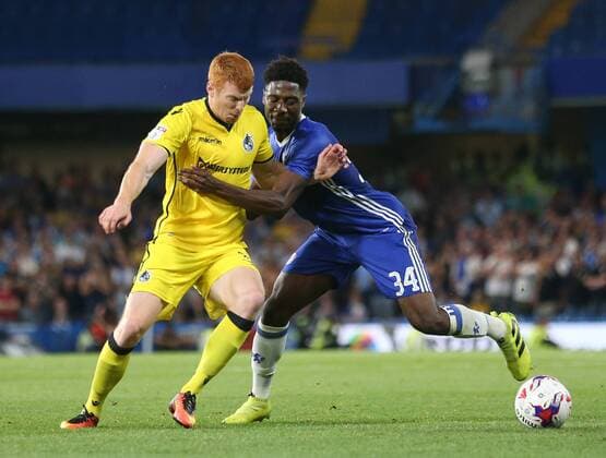 Chelsea s Ola Aina tussles with Bristol Rovers Rory Gaffney during the EFL Cup match at the Stamford Bridge Stadium, London. Picture date August 23rd, 2016 Pic David Klein Sportimage EDITORIAL USE ONLY. No use with unauthorised audio, video, data, fixture lists, club league logos or live services. Online in-match use limited to 120 images, no video emulation. No use in betting, games or single club league player publications.