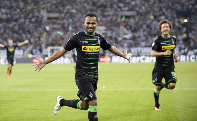 Raffael of Moenchengladbach (L) celebrates scoring the 2:0 goal during the championsleague qualification match between Borussia Moenchengladbach and BSC Young Boys, Borussiapark in Moenchengladbach on August 24., 2016. Borussia Mönchengladbach vs. Young Boys Bern in der Champions League Qualifikation der Saison 2016 2017 am 24.August 2016.
