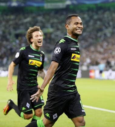 Raffael of Moenchengladbach (L) celebrates scoring the 2:0 goal during the championsleague qualification match between Borussia Moenchengladbach and BSC Young Boys, Borussiapark in Moenchengladbach on August 24., 2016. Borussia Mönchengladbach vs. Young Boys Bern in der Champions League Qualifikation der Saison 2016 2017 am 24.August 2016.