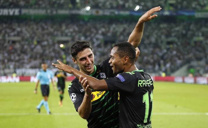 Raffael of Moenchengladbach (R) celebrates scoring the 3:0 goal with Lars Stindl of Moenchengladbach during the championsleague qualification match between Borussia Moenchengladbach and BSC Young Boys, Borussiapark in Moenchengladbach on August 24., 2016. Borussia Mönchengladbach vs. Young Boys Bern in der Champions League Qualifikation der Saison 2016 2017 am 24.August 2016.