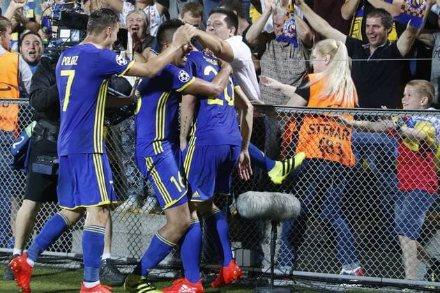 ROSTOV-ON-DON, RUSSIA - AUGUST 24, 2016: Rostov s players celebrate scoring in the 2016 17 UEFA Champions League First playoff round 2nd leg match against Ajax Amsterdam at Olimp-2 Stadium. Valery Matytsin TASS  TS02E7DF