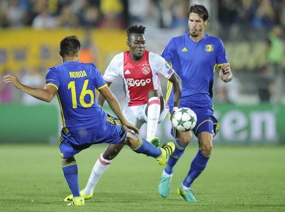 ROSTOV-ON-DON, RUSSIA - AUGUST 24, 2016: Rostov s Christian Noboa (L), Cesar Navas (R) and Ajax s Bertrand Traore (C) fight for the ball in their 2016 17 UEFA Champions League First playoff round 2nd leg match at Olimp-2 Stadium. FC Rostov won the game 4:1. Valery Matytsin TASS  TS02E7EF