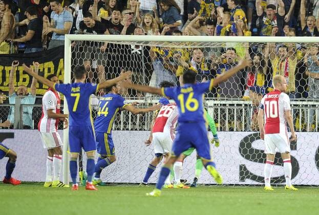 ROSTOV-ON-DON, RUSSIA - AUGUST 24, 2016: Rostov s players celebrate scoring in the 2016 17 UEFA Champions League First playoff round 2nd leg match against Ajax Amsterdam at Olimp-2 Stadium. FC Rostov won the game 4:1. Valery Matytsin TASS  TS02E807