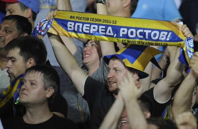 ROSTOV-ON-DON, RUSSIA - AUGUST 24, 2016: Rostov s fans rooting for their team in the 2016 17 UEFA Champions League First playoff round 2nd leg match against Ajax Amsterdam at Olimp-2 Stadium. FC Rostov won the game 4:1. Valery Matytsin TASS  TS02E80D