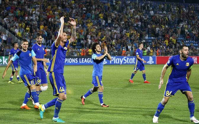 ROSTOV-ON-DON, RUSSIA - AUGUST 24, 2016: Rostov s Saeid Ezatolahi, Alexander Yerokhin, Cesar Navas, Khoren Bairamyan and Alexandru Gatcan (L-R) celebrate their victory in the 2016 17 UEFA Champions League First playoff round 2nd leg match against Ajax Amsterdam at Olimp-2 Stadium. FC Rostov won the game 4:1. Valery Matytsin TASS  TS02E814