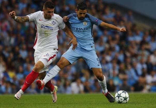 24.08.2016. Etihad Stadium, Manchester, England. Champions League Qualifying Football. Manchester City versus Steaua Bucharest. Manchester City striker Nolito holds off Steaua Bucharest defender Ovidiu Popescu. xAlanxMartinx  ActionPlus11779992